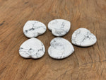 Howlite heart worry stone from GemstoneGO, a soothing crystal with polished surface for stress relief and calming energy.