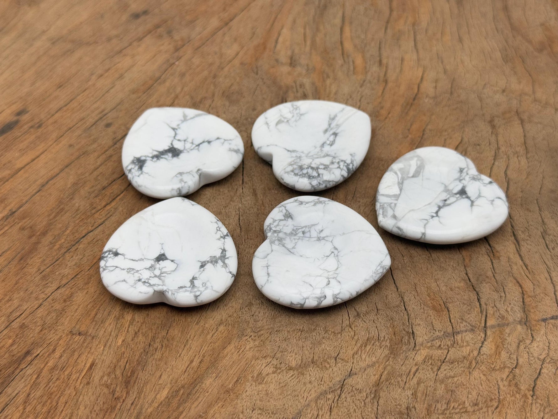 Howlite heart worry stone from GemstoneGO, a soothing crystal with polished surface for stress relief and calming energy.