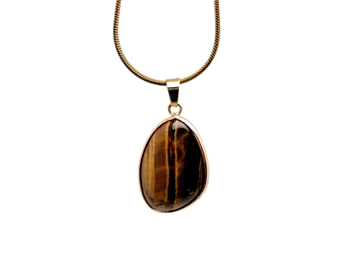 Dainty gemstone pendant from GemstoneGO featuring a colorful birthstone charm in gold and silver with crystal accents.