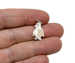 Natural pearl penguin pendant by GemstoneGO featuring gemstone and sea shell details on a jewelry pendant.