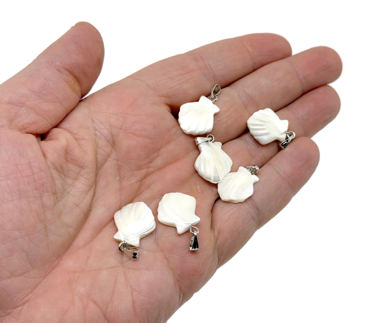 Natural pearl shell pendant featuring sea shell design and gemstone accents, crafted by GemstoneGO.