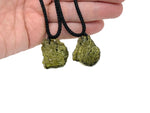 Silver necklace featuring a genuine Moldavite gemstone pendant, perfect for spiritual growth and healing.