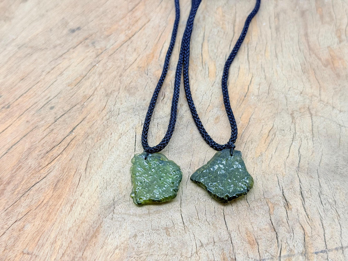Silver Moldavite necklace featuring a genuine green Moldavite stone, ideal for spiritual growth and unique gemstone jewelry.