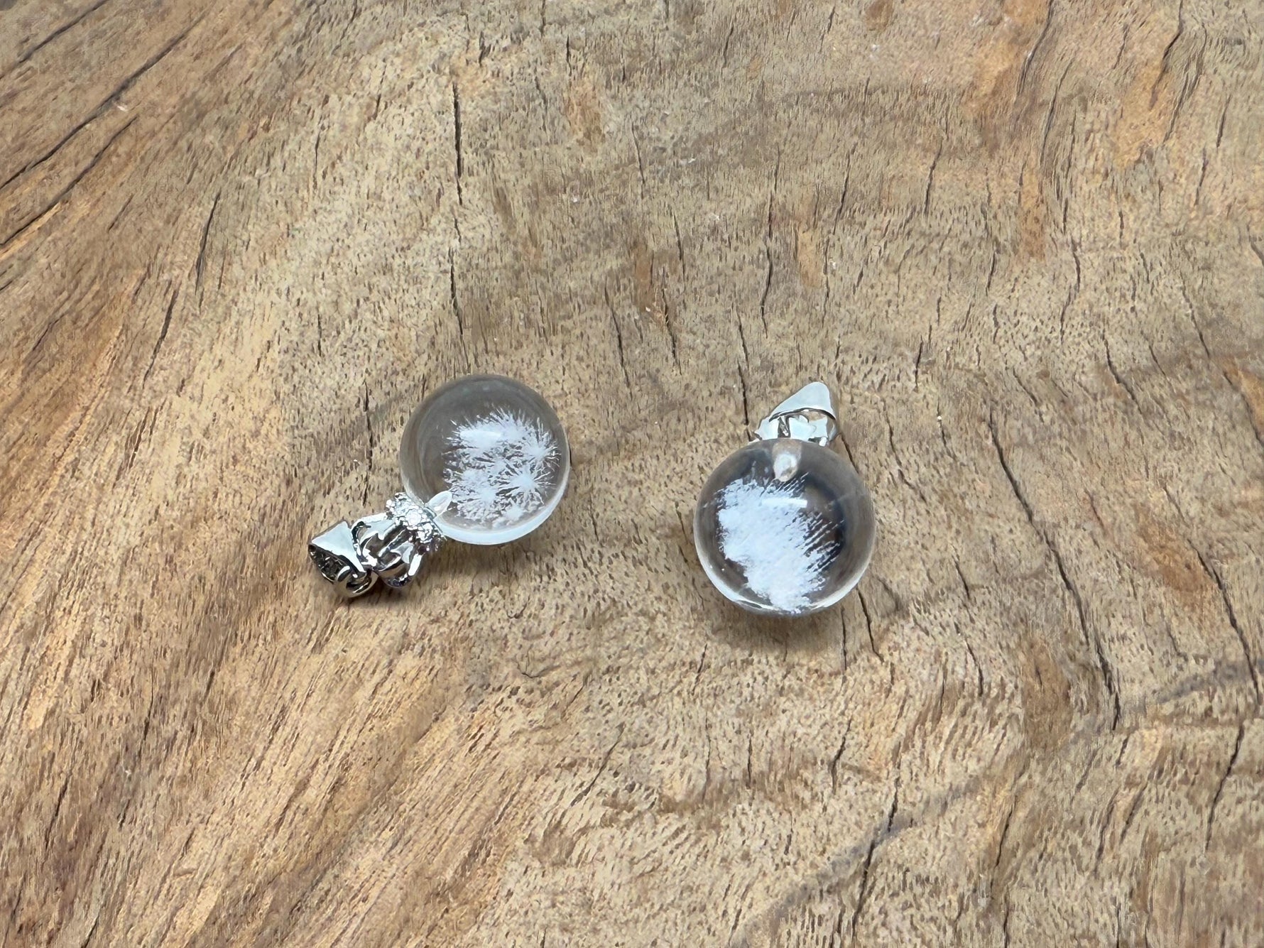 Mini snowflake clear quartz ball crystal pendant by GemstoneGO, showcasing a polished transparent quartz sphere on a simple chain.