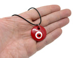 Blue and red glass evil eye necklace by GemstoneGO featuring a protective evil eye pendant on a delicate chain.