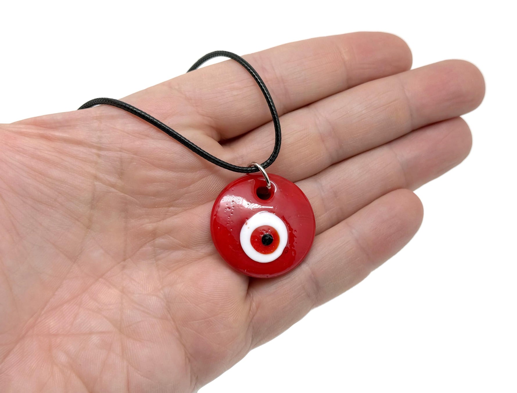 Blue and red glass evil eye necklace by GemstoneGO featuring a protective evil eye pendant on a delicate chain.