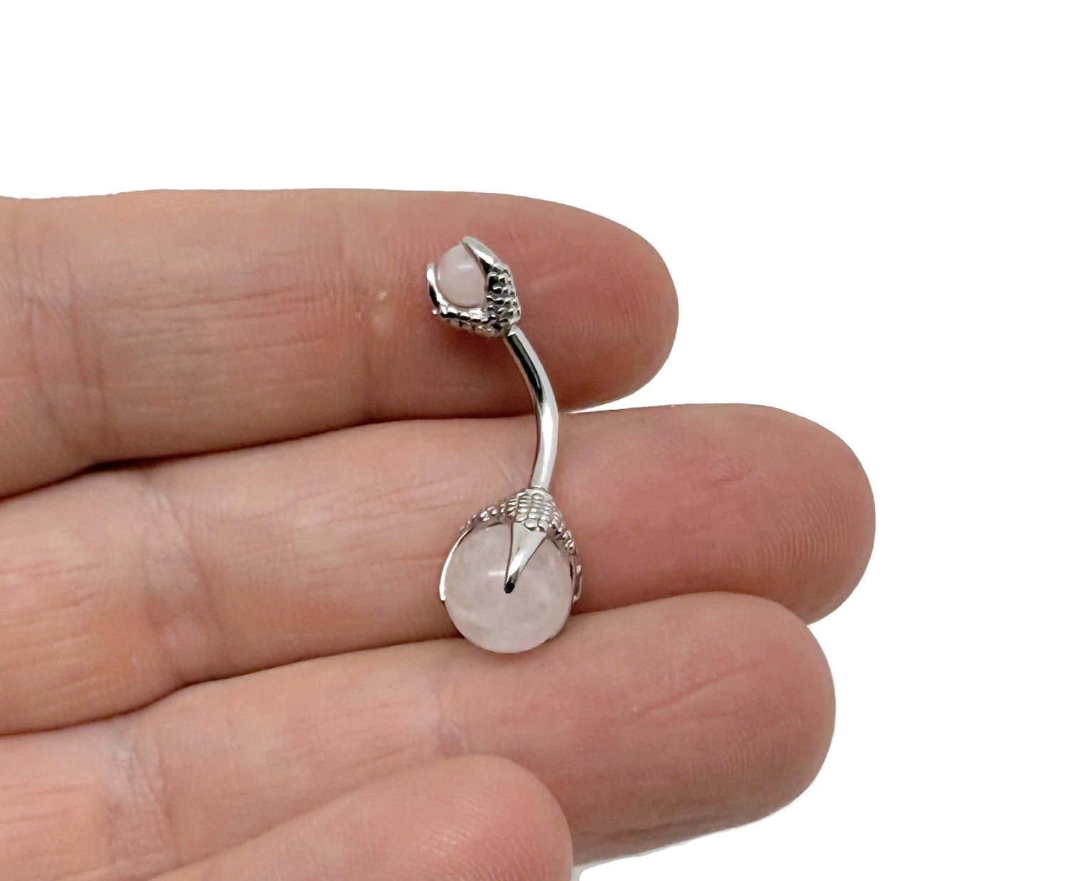Rose quartz belly button ring with silver stainless steel, featuring a gemstone navel piercing jewelry design.