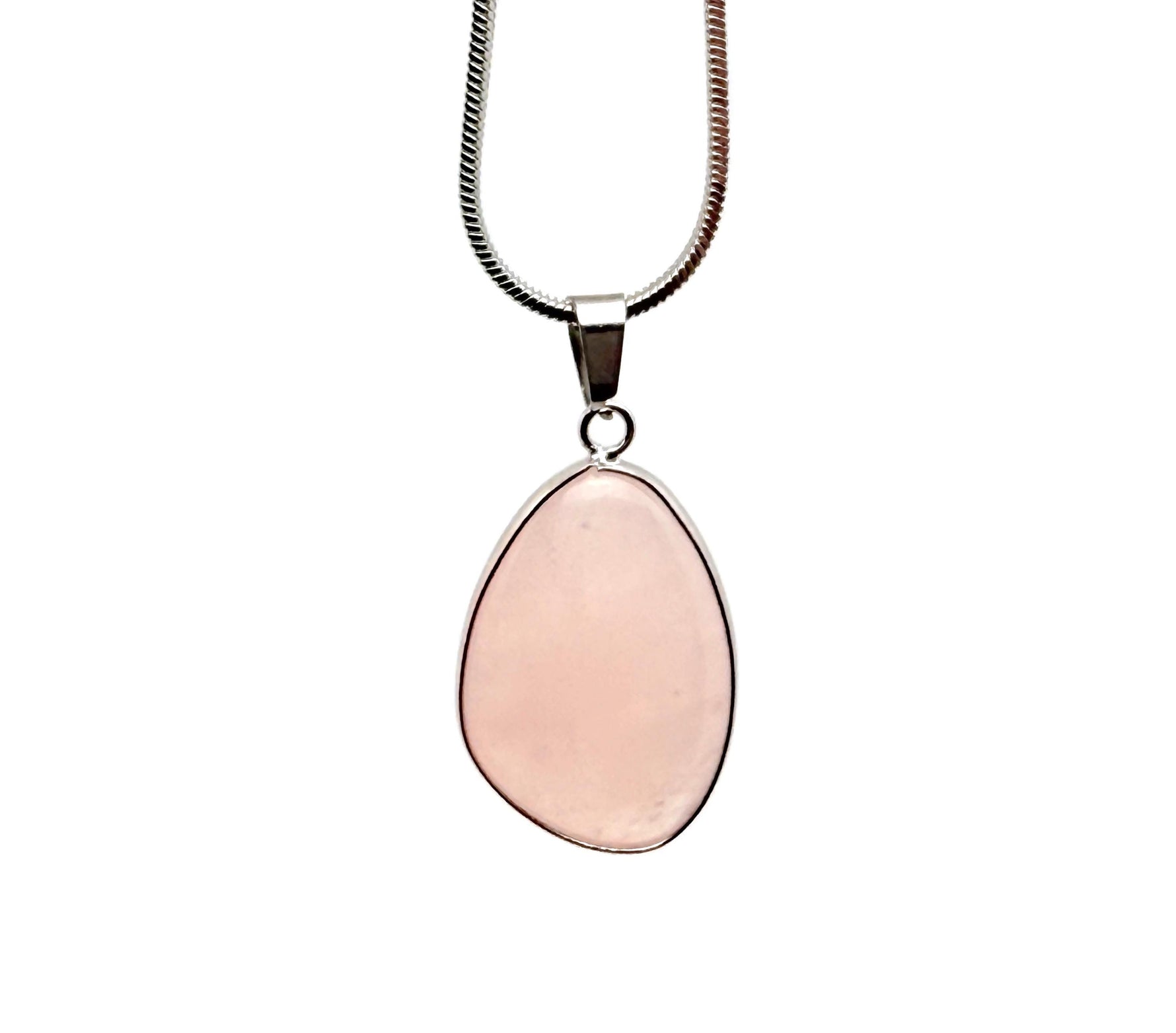 Dainty rose quartz gemstone pendant with silver setting, ideal for DIY jewelry charms, showcasing a polished pink stone on a silver chain