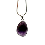 Dainty silver gemstone pendant featuring a polished amethyst stone, ideal for DIY jewelry charms from GemstoneGO.