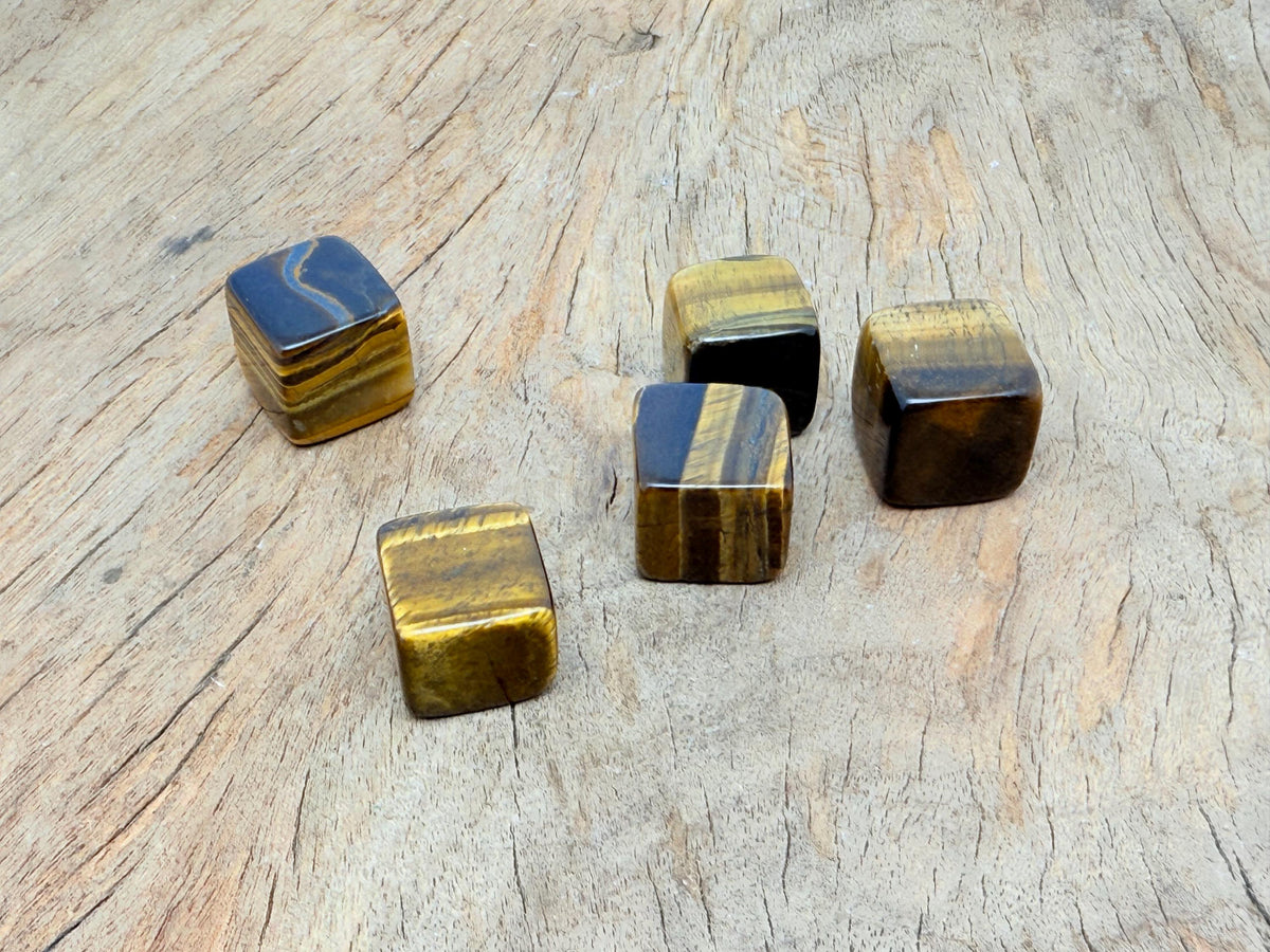 Handmade 16mm Tiger Eye cube stone from GemstoneGO, showcasing its polished, earthy brown and golden banded appearance.