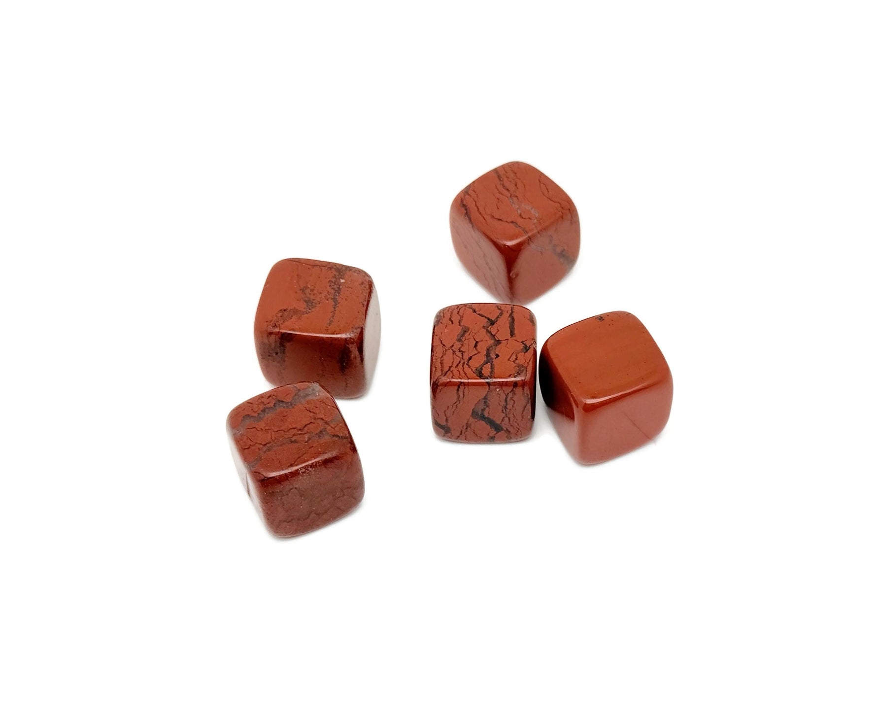 Handmade 16mm red Jasper cube stone by GemstoneGO, showing smooth carved surface and vibrant red color with natural patterns.