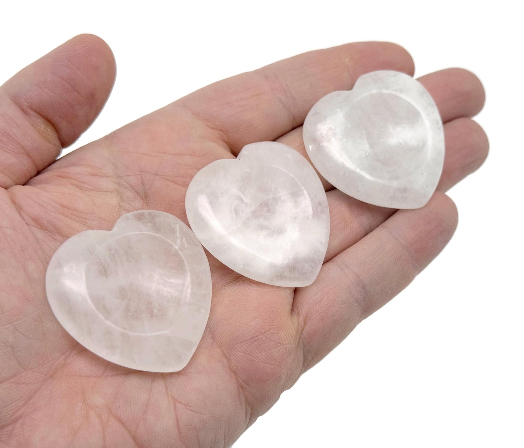 Natural crystal worry stone from GemstoneGO, soothing heart chakra crystal for stress relief and relaxation, perfect for travel.