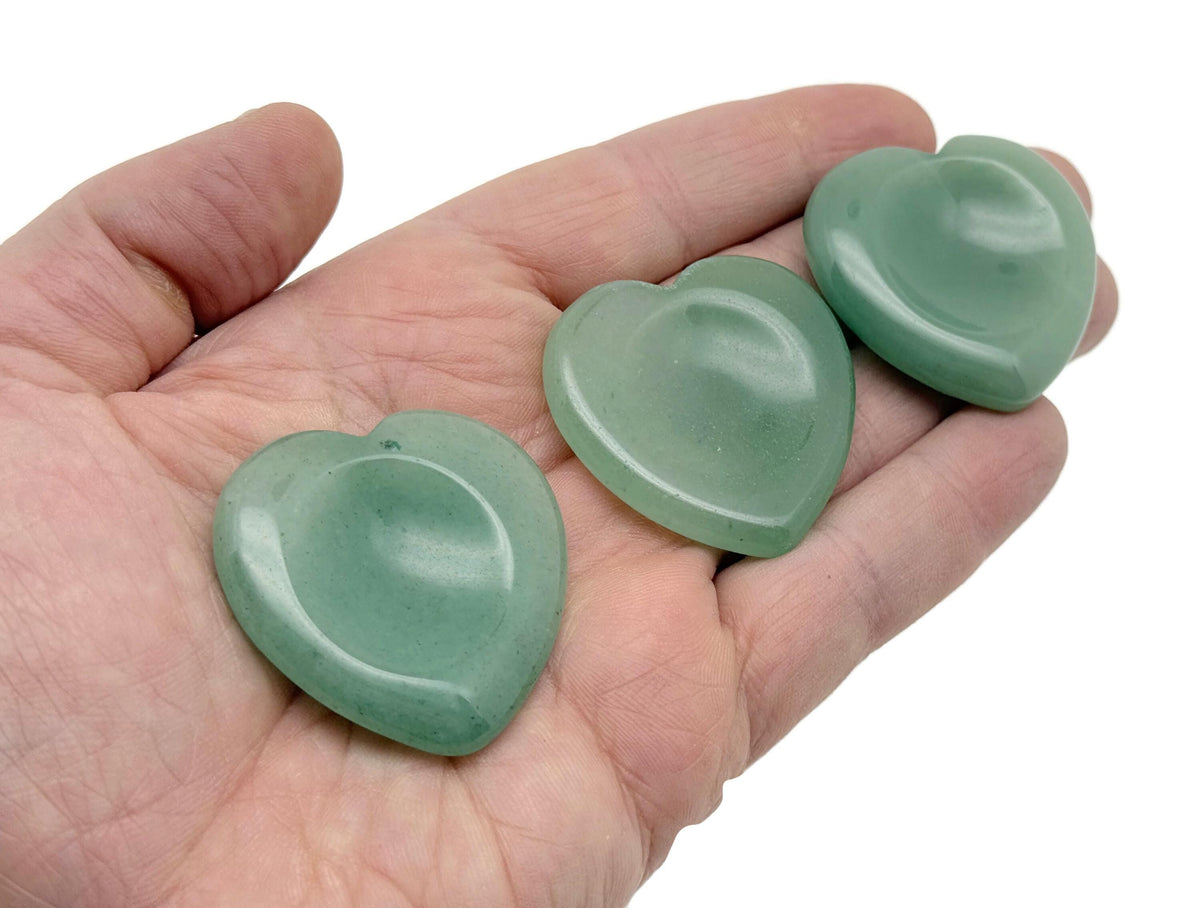 Aventurine heart worry stone from GemstoneGO, a soothing green crystal with polished smooth surface and natural stone details.