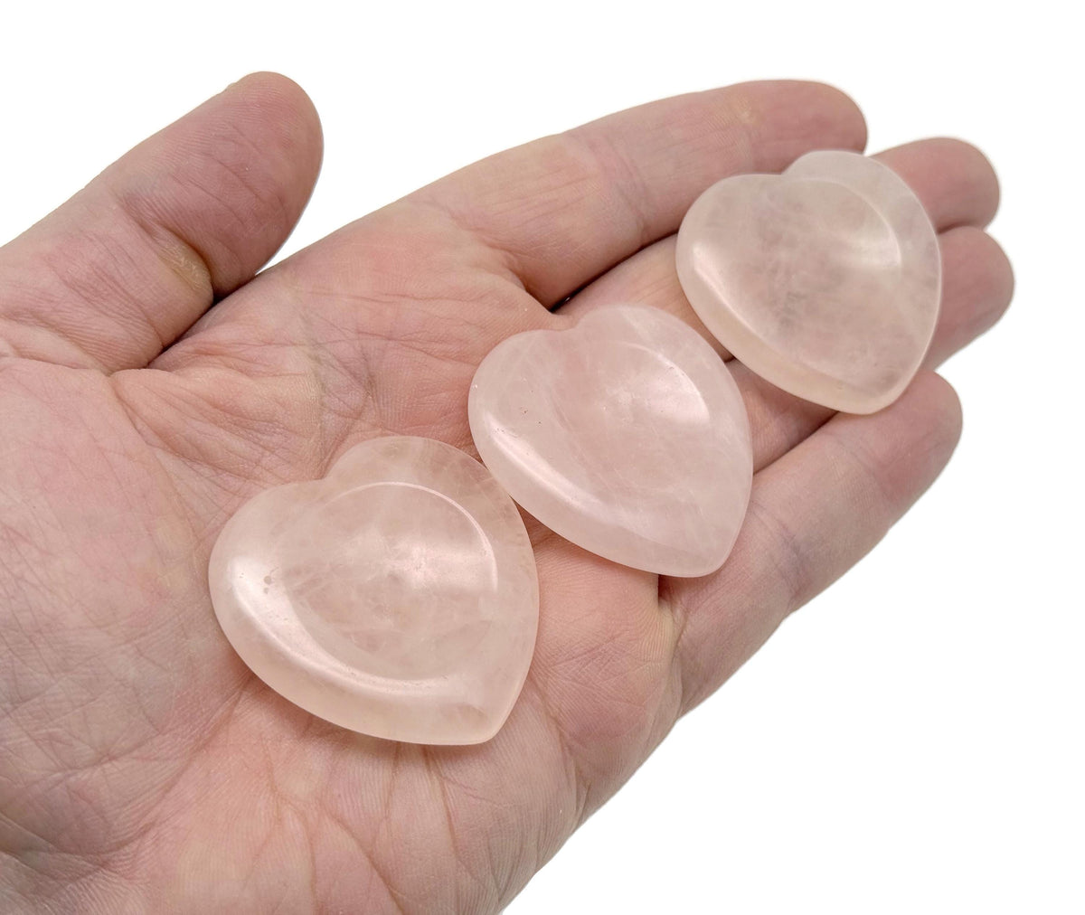 Rose quartz heart worry stone from GemstoneGO, smooth soothing crystal with a polished pink heart shape for stress relief.
