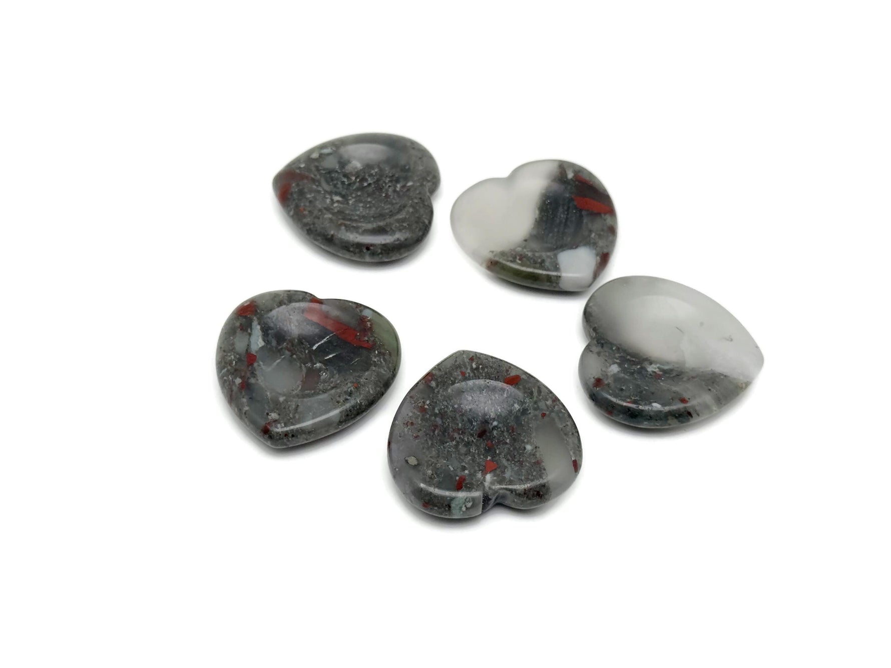 African Bloodstone heart worry stone from GemstoneGO, featuring a smooth, polished bloodstone crystal for stress relief and meditation.