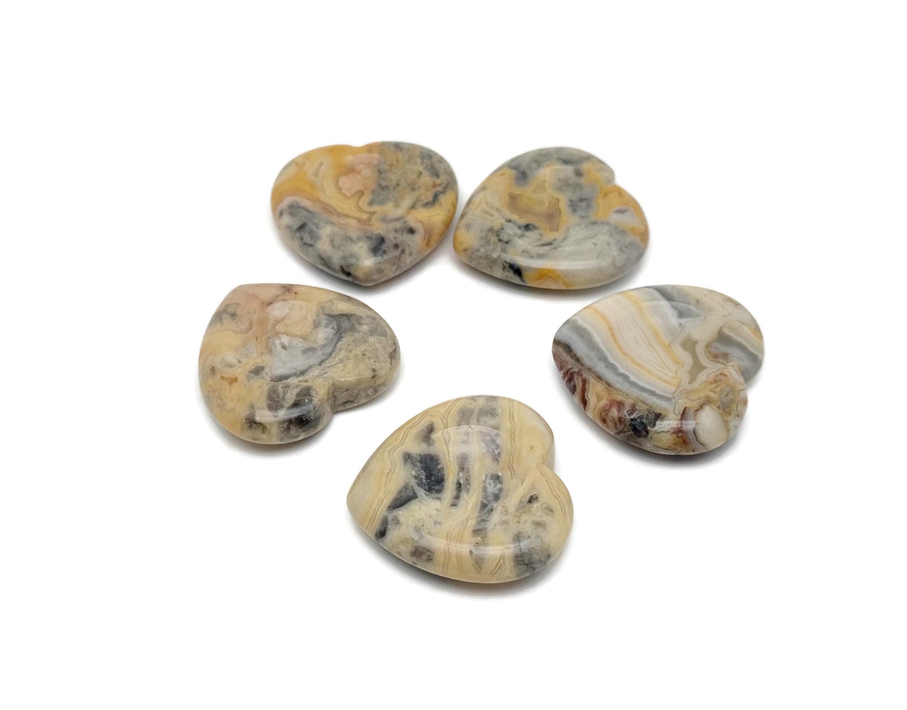 Crazy Lace Agate heart worry stone from GemstoneGO, featuring vibrant banded crystal with soothing, calming properties.