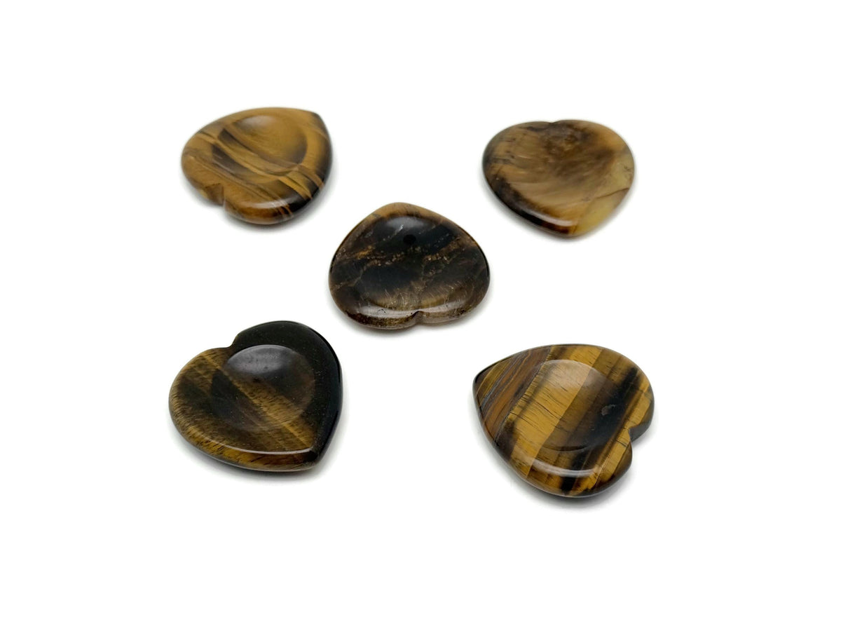 Tiger Eye heart worry stone from GemstoneGO, showcasing a smooth, polished crystal with warm golden-brown hues and natural banding.
