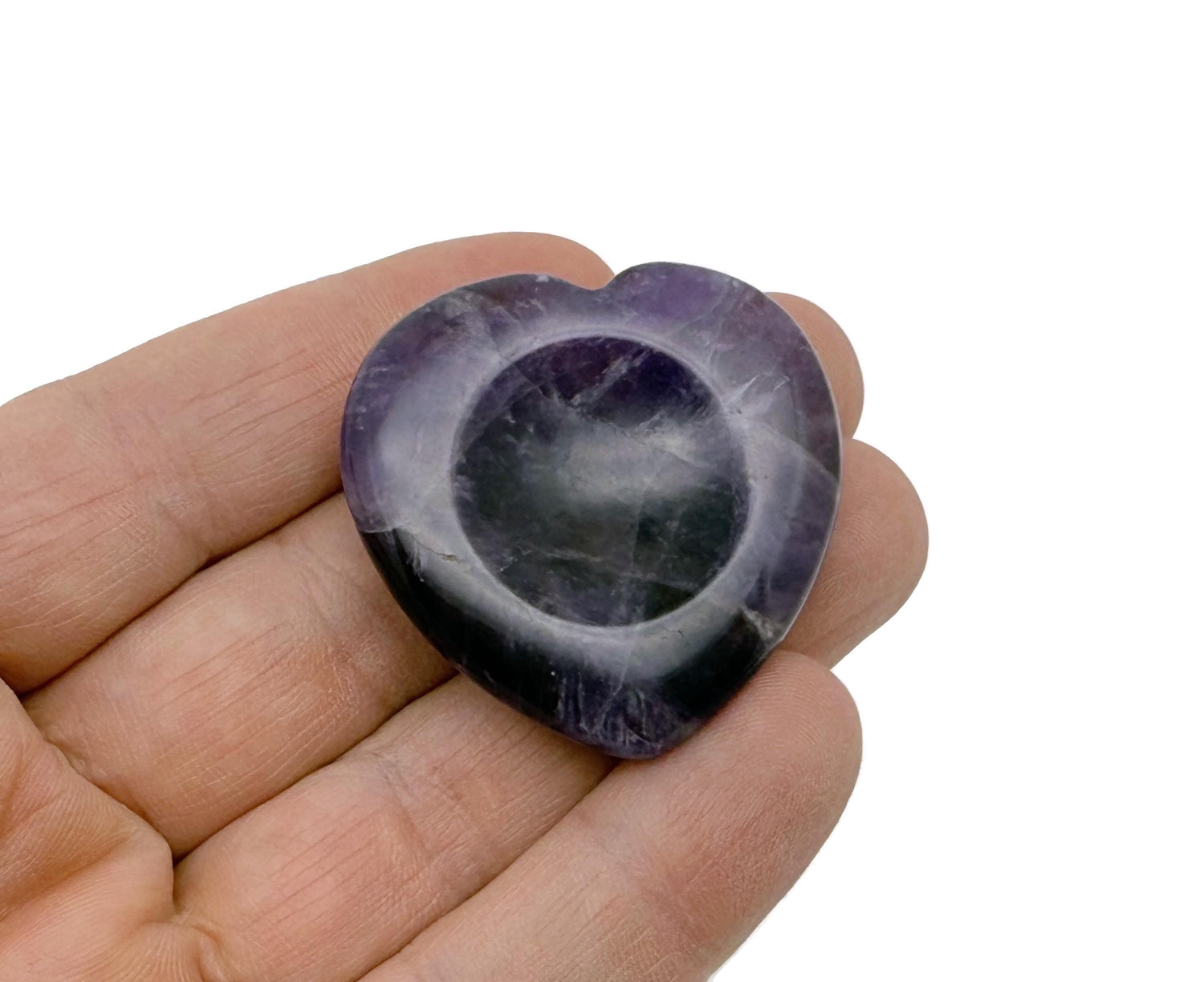 Amethyst heart-shaped worry stone from GemstoneGO, soothing crystal with polished surface, ideal for stress relief and meditation.