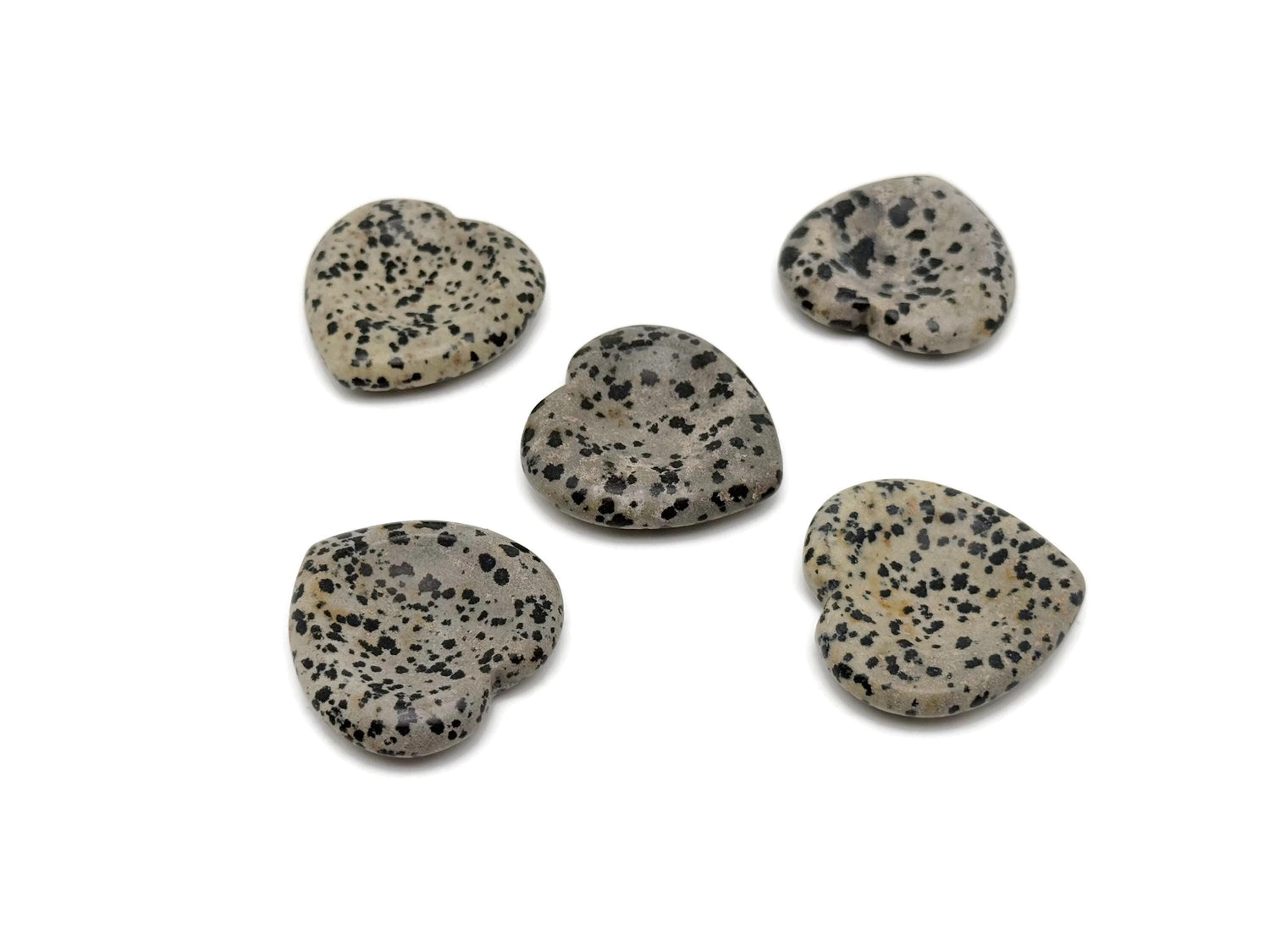 Dalmatian Jasper heart worry stone by GemstoneGO, featuring black and beige spotted crystal for stress relief and soothing energy.