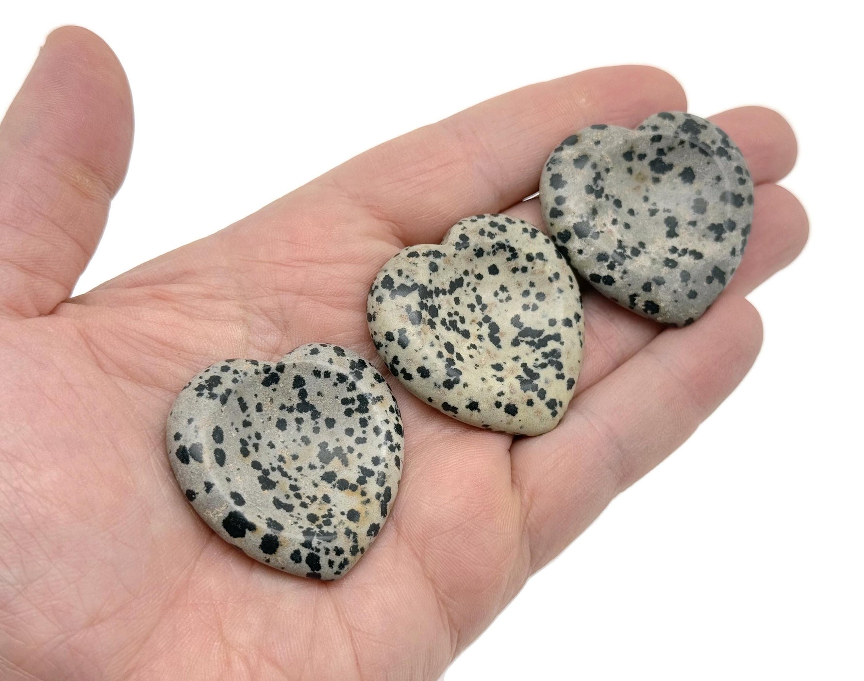 Dalmatian Jasper heart worry stone from GemstoneGO, featuring black and cream spotted crystal for soothing stress relief.