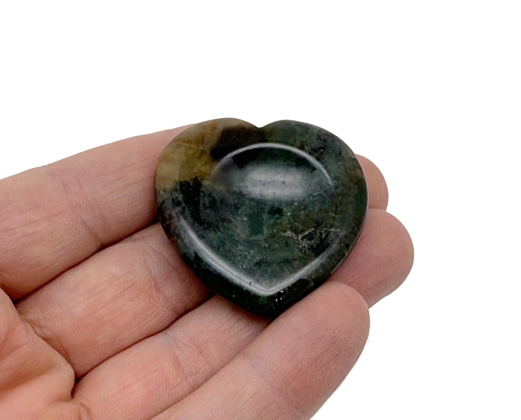 Moss agate heart-shaped worry stone from GemstoneGO, featuring soothing green and brown crystal patterns for stress relief.