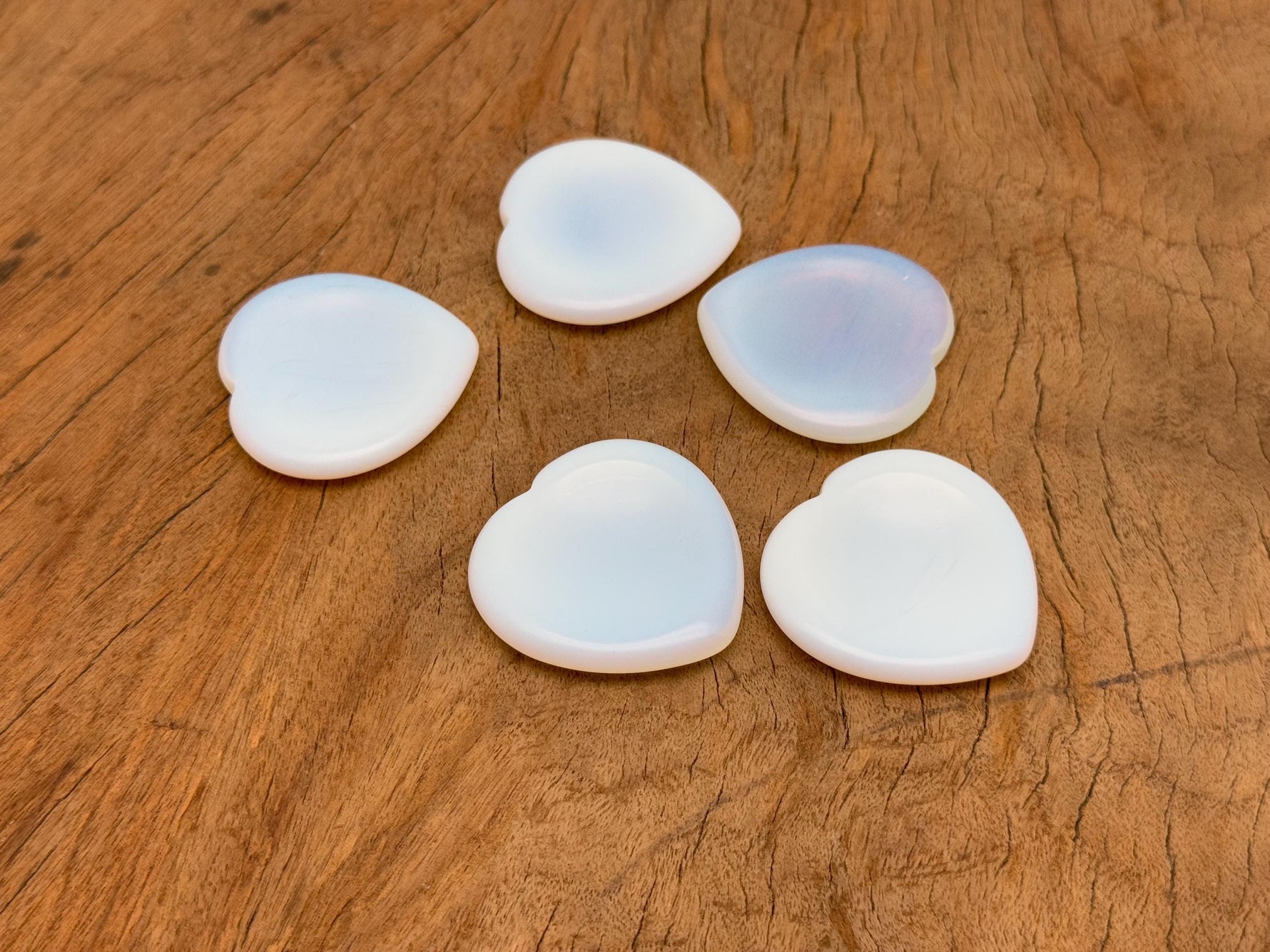 Opalite heart-shaped worry stone from GemstoneGO, a soothing crystal for stress relief and calming energy.