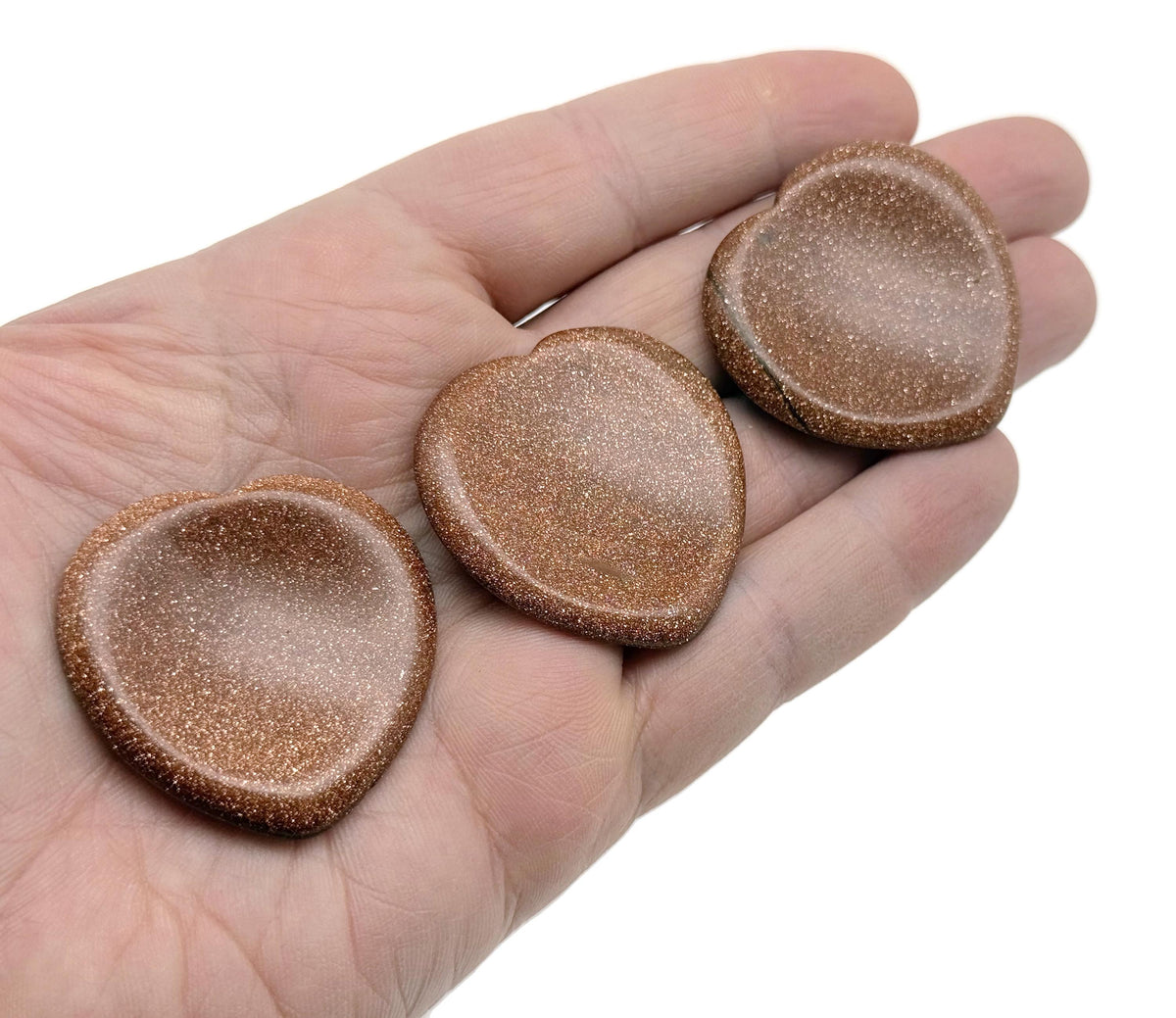 Goldstone heart-shaped worry stone from GemstoneGO, featuring soothing crystal properties and a polished, smooth surface.