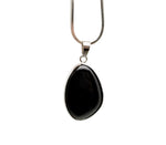 Dainty obsidian silver gemstone pendant with intricate charm design, perfect for DIY jewelry making by GemstoneGO.