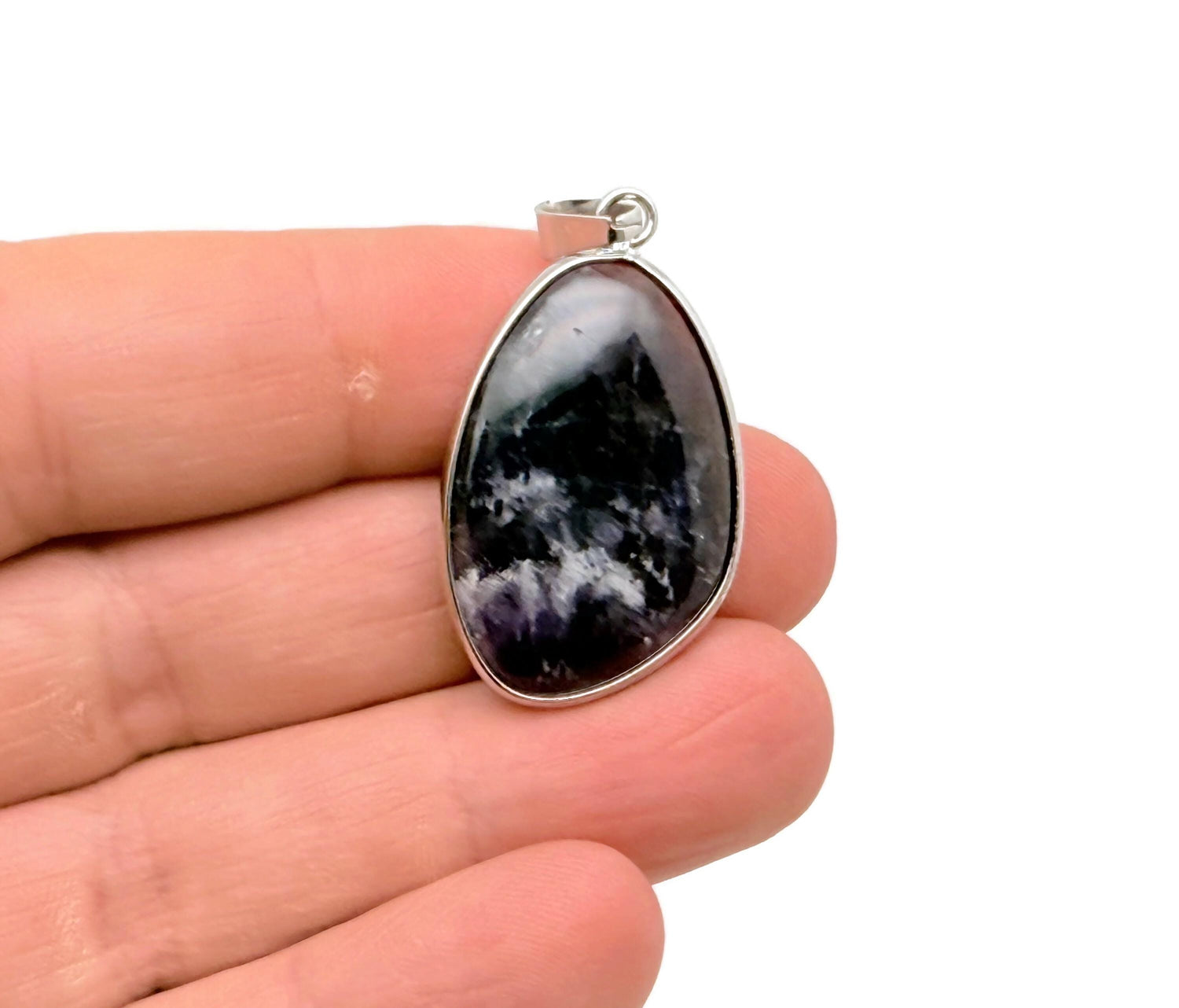 Dainty silver gemstone pendant featuring a polished amethyst stone, ideal for DIY jewelry making from GemstoneGO.