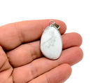 Dainty silver pendant featuring a polished howlite gemstone charm, perfect for DIY jewelry making by GemstoneGO.