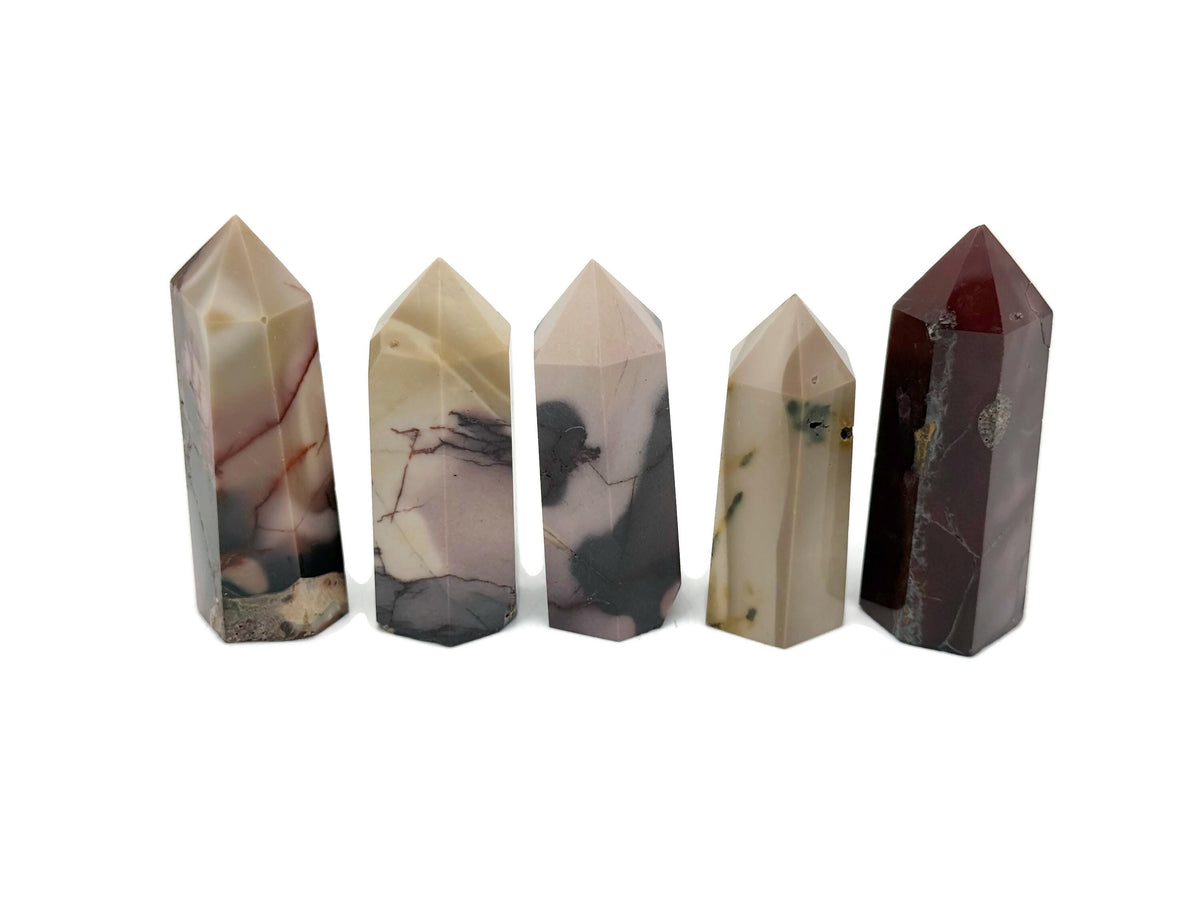Mookaite Jasper obelisk tower crystal from GemstoneGO, showcasing vibrant earthy red and yellow tones with a pointed top.