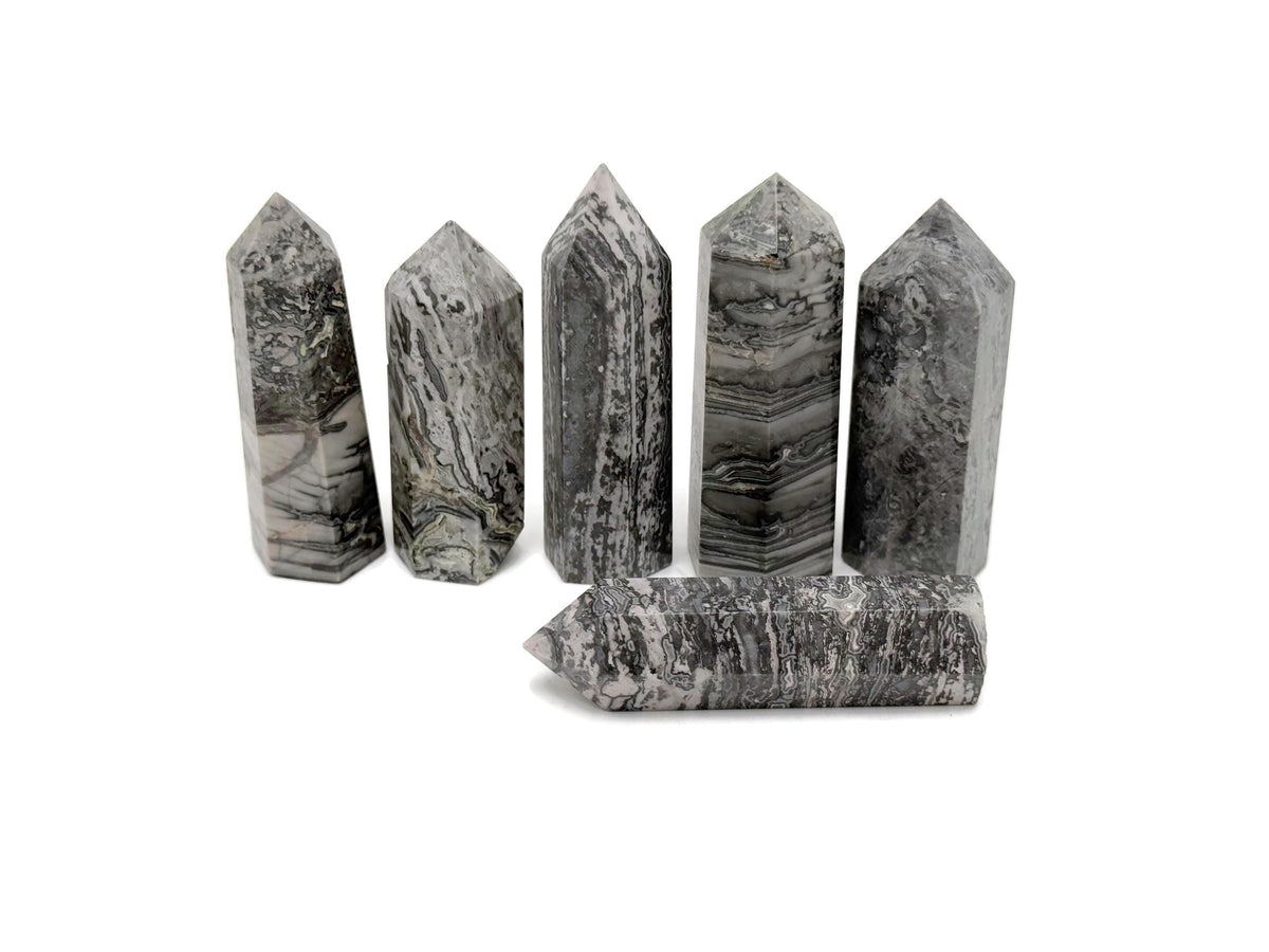 Picasso Jasper obelisk tower crystal from GemstoneGO, showcasing vibrant patterns and polished stone shape for decorative display.