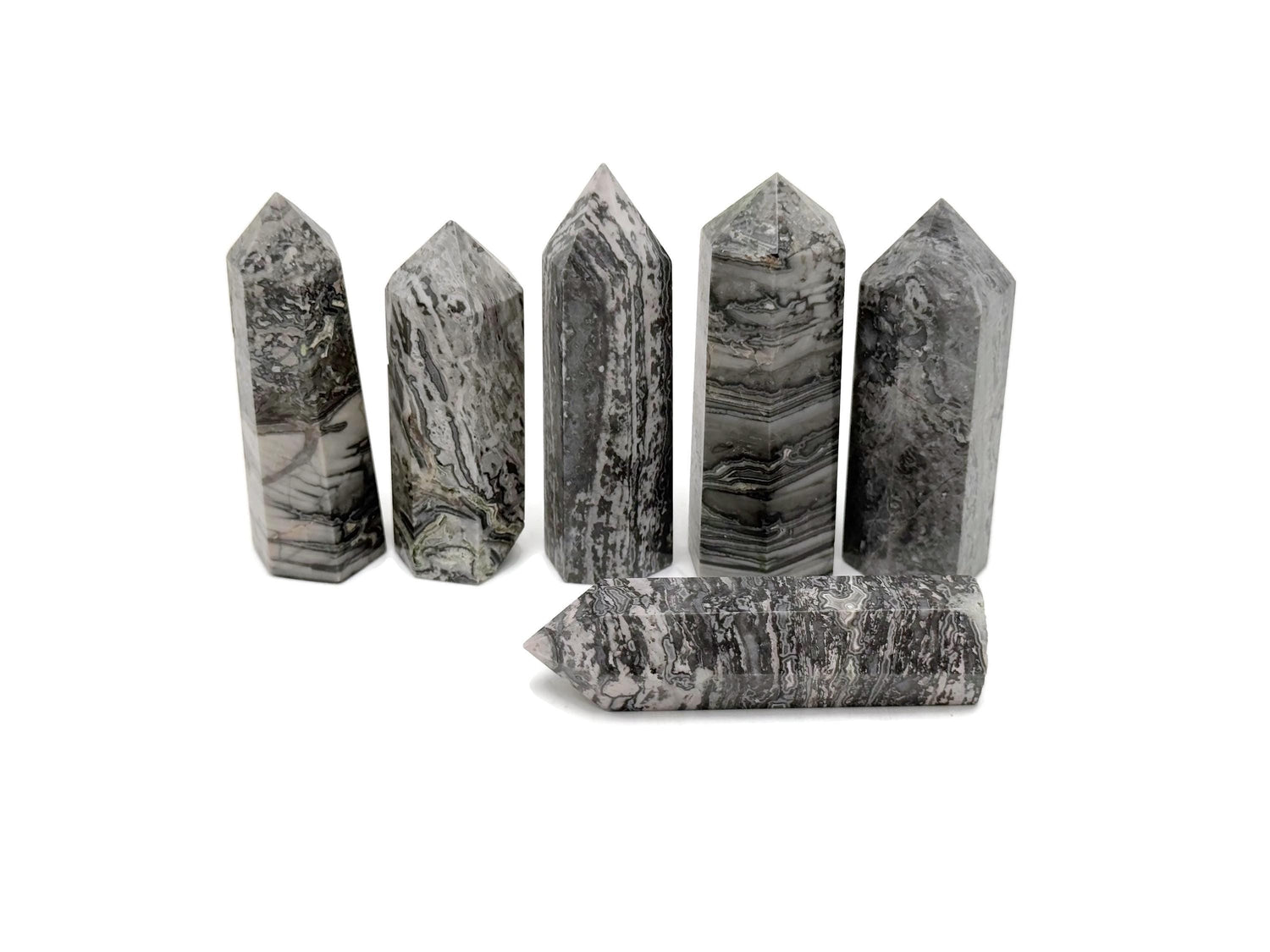 Picasso Jasper obelisk tower crystal from GemstoneGO, showcasing vibrant patterns and polished stone shape for decorative display.