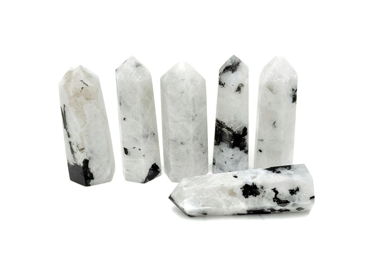 Rainbow Moonstone obelisk tower crystal from GemstoneGO, showcasing a luminous, polished gemstone with natural rainbow shimmer.
