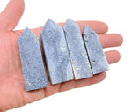 Blue coral obelisk tower crystal from GemstoneGO, featuring a polished blue coral gemstone carved into a tall, slender obelisk shape.