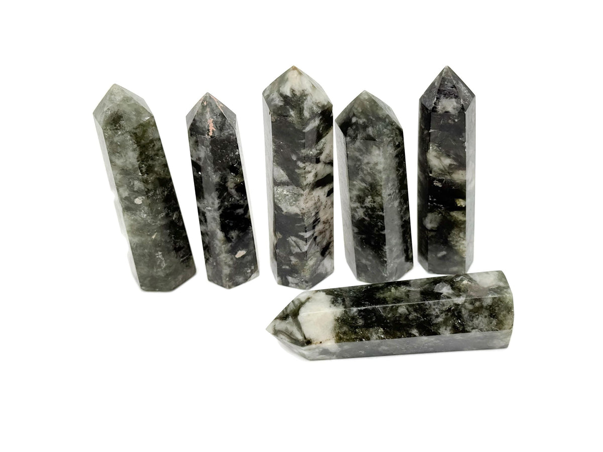 Green Lepidolite obelisk tower crystal from GemstoneGO, showcasing vibrant green mineral with natural crystal formations.