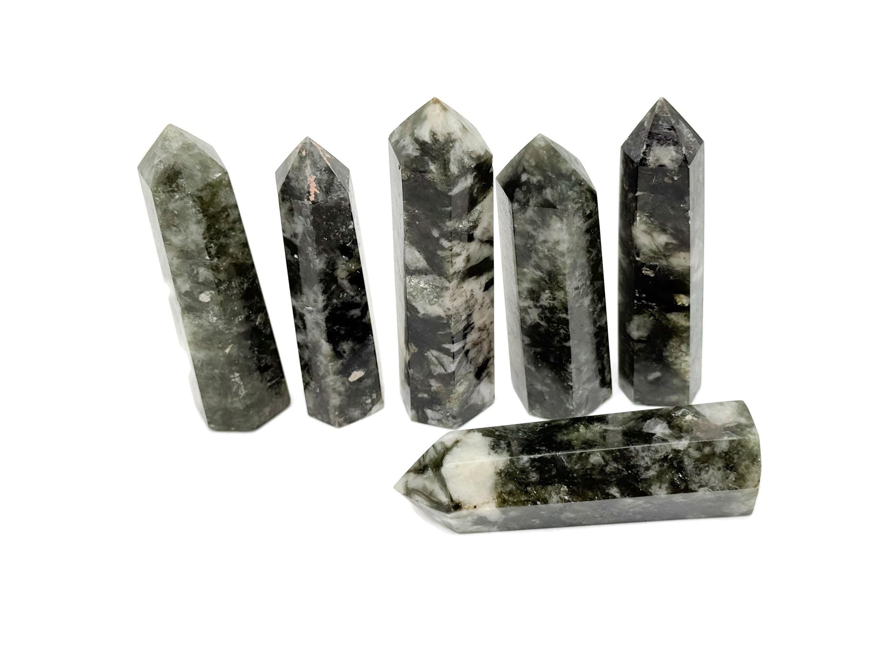 Green Lepidolite obelisk tower crystal from GemstoneGO, showcasing vibrant green mineral with natural crystal formations.