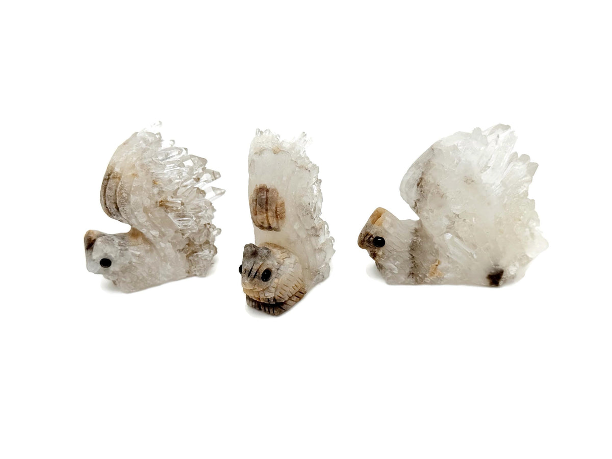 Squirrel-shaped quartz gemstone carving by GemstoneGO, detailed squirrel figure with natural gemstone texture and color.