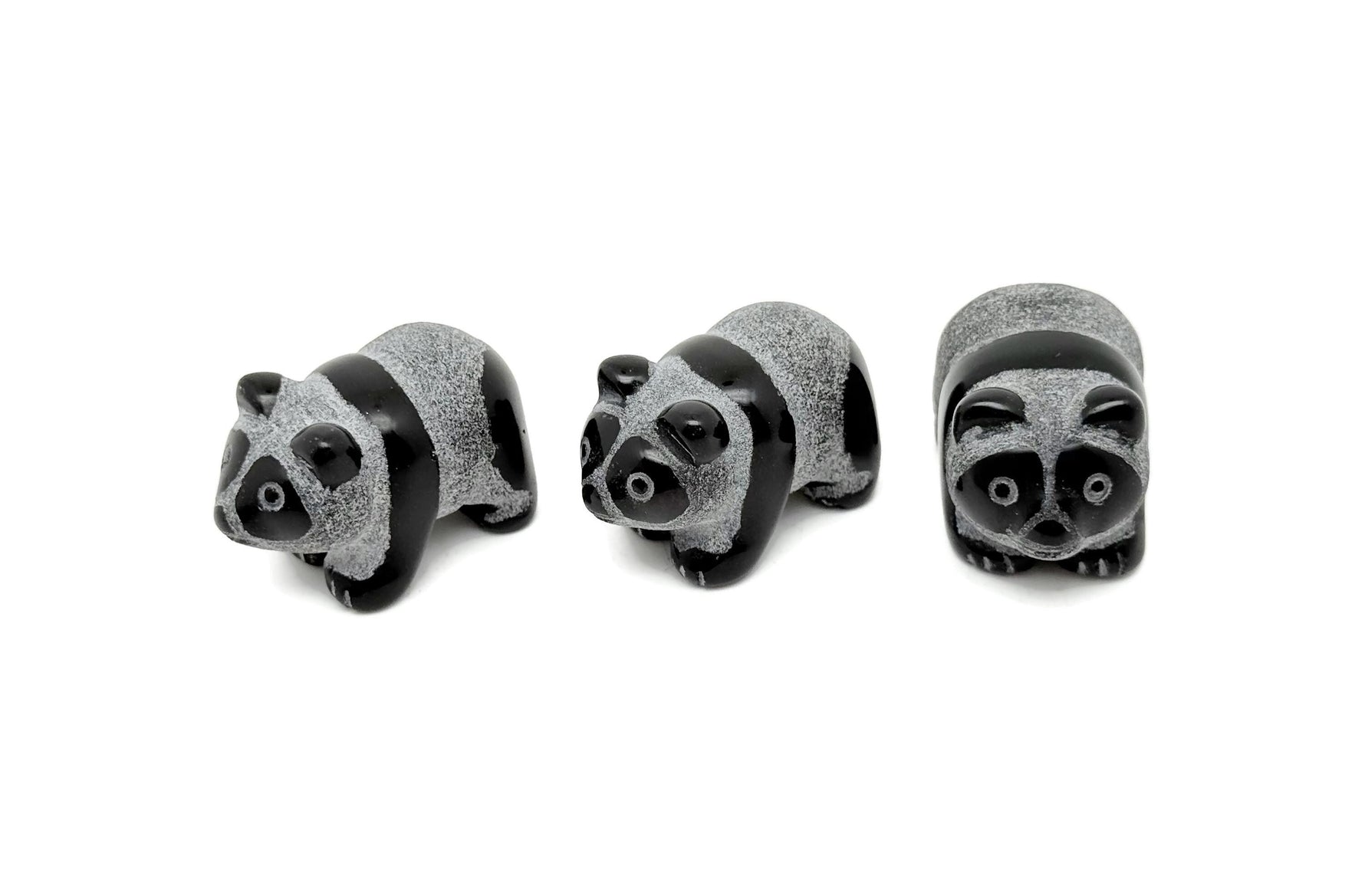 Panda-shaped Obsidian gemstone carving, 40mm, from GemstoneGO, showcasing smooth black stone with detailed panda features.