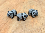 Panda Obsidian carving gemstone from GemstoneGO, 40mm, showcasing a detailed panda figure in shiny black obsidian.