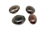 Smoky Quartz palm gemstone spa stone from GemstoneGO, showcasing a polished, natural smoky quartz gemstone for healing and relaxation.