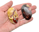Mookaite Jasper palm gemstone spa stone from GemstoneGO, showing smooth, polished natural red and yellow Jasper stone for healing and relaxation.