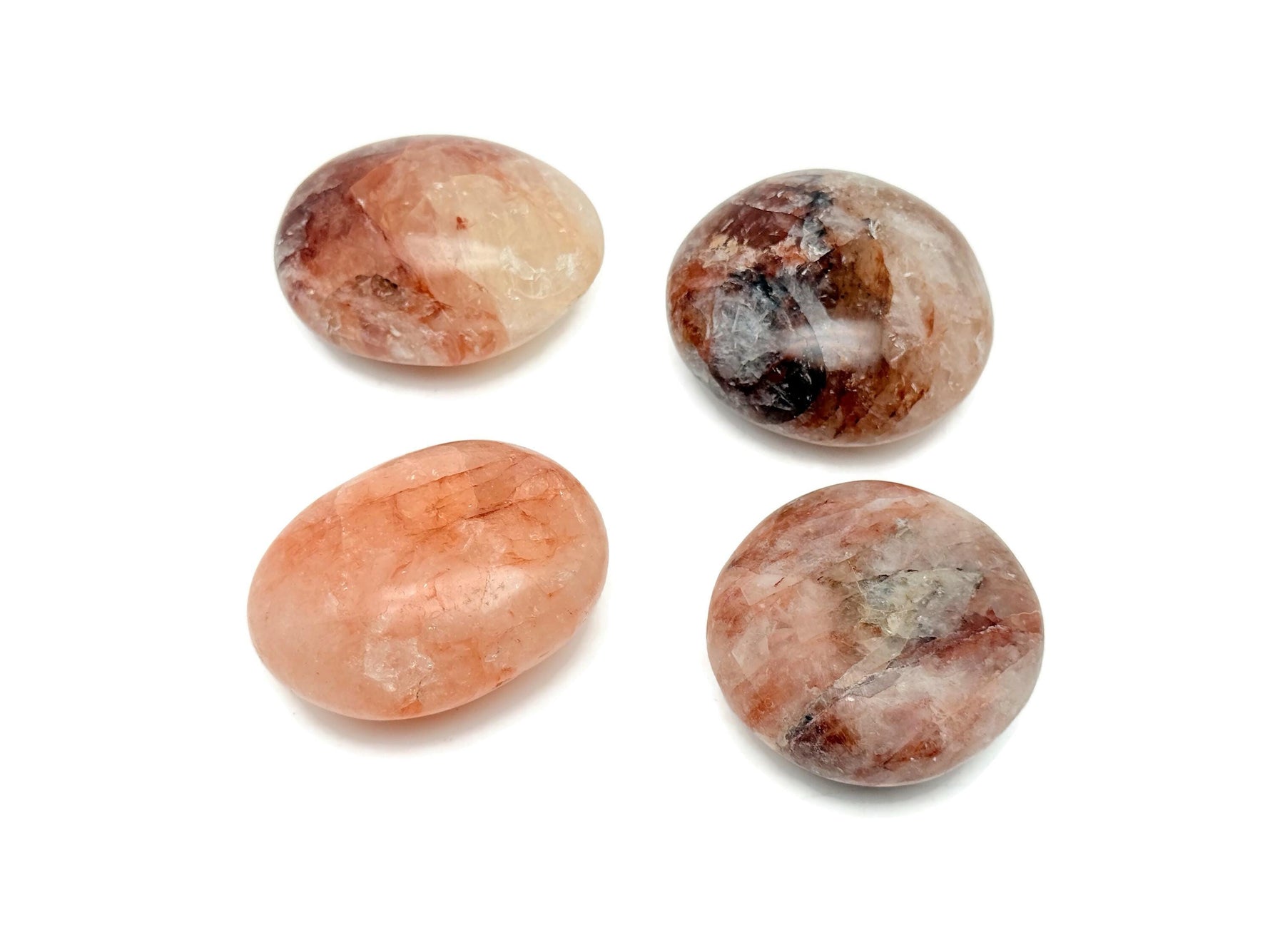 Red Hematoid Quartz Fire Quartz palm gemstone, spa stone from GemstoneGO, showcasing vibrant red and smoky quartz details.