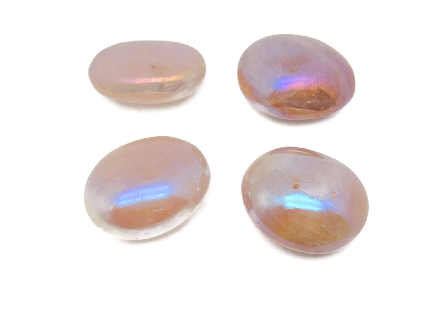 Angel Aura Quartz palm gemstone spa stone from GemstoneGO, showcasing iridescent, polished quartz with a smooth, oval shape.
