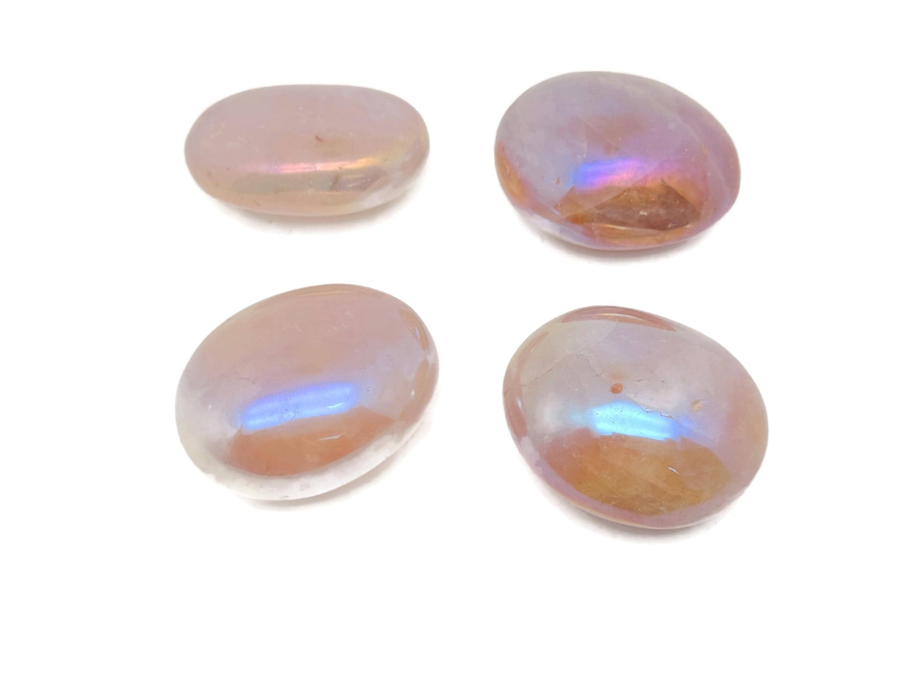 Angel Aura Quartz palm gemstone spa stone from GemstoneGO, showcasing iridescent, polished quartz with a smooth, oval shape.