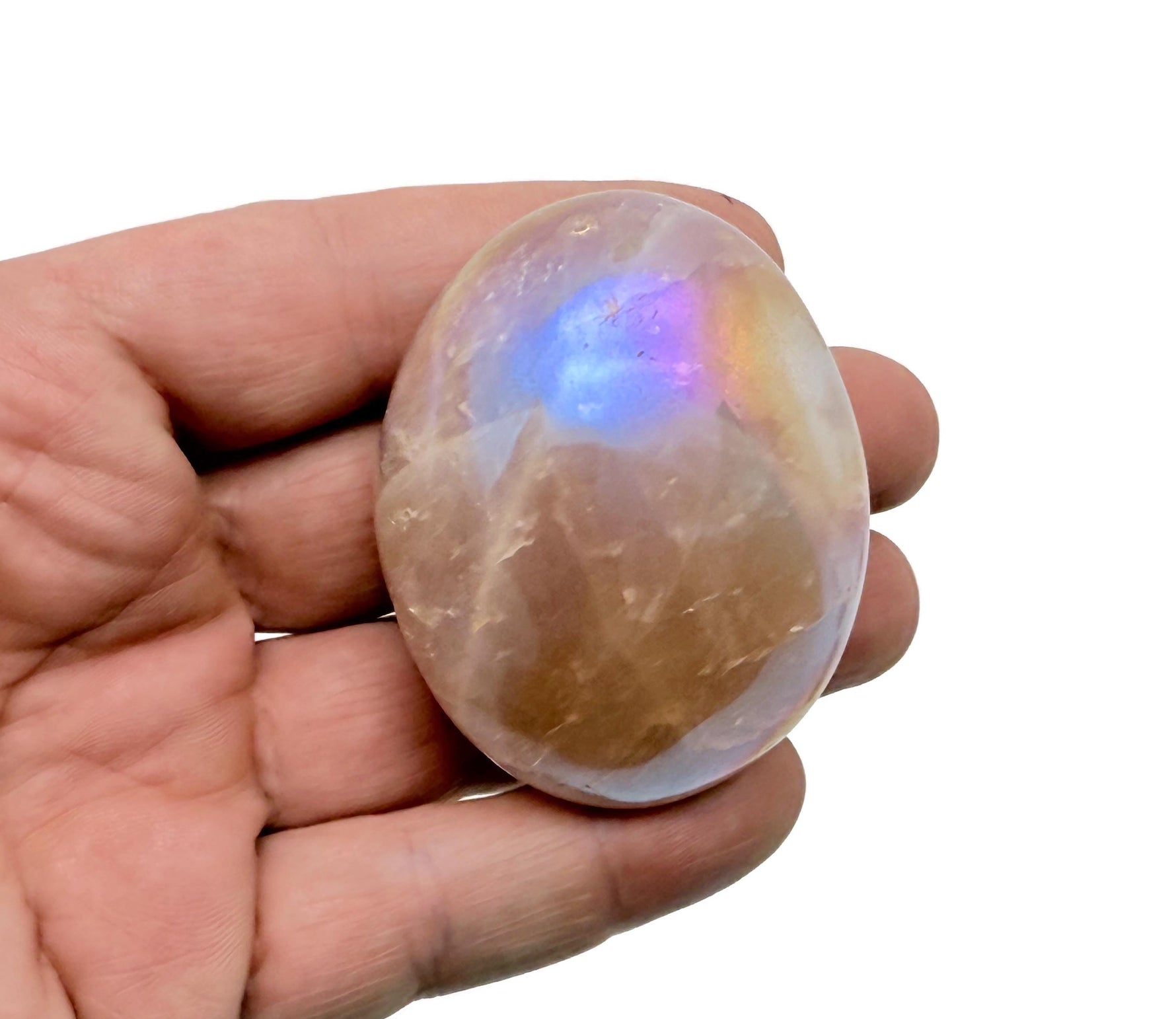 Angel Aura Quartz palm gemstone spa stone from GemstoneGO, showcasing a shimmering, iridescent aura finish on a smooth palm-sized stone.