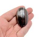 Tiger Iron palm gemstone spa stone, 50-60mm, with polished surface and natural banded patterns, by GemstoneGO.