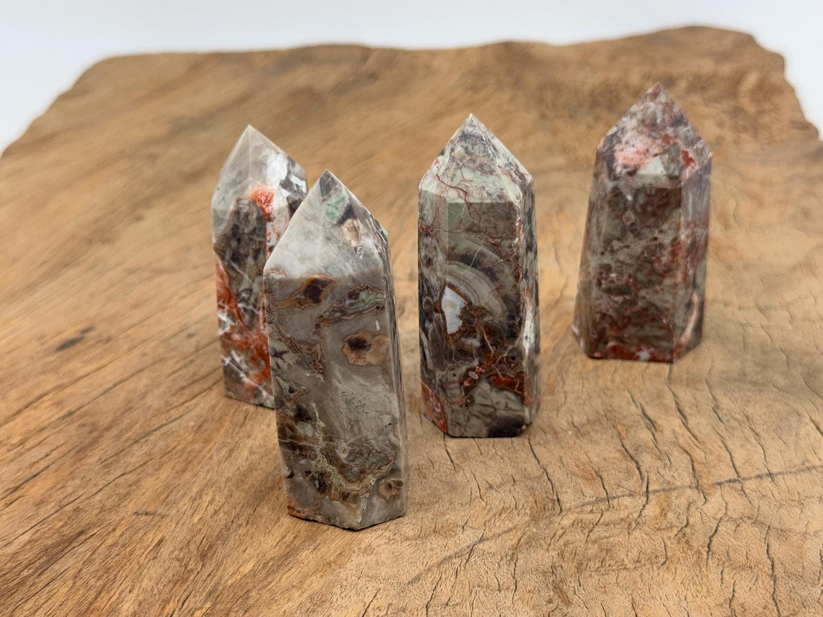 Leopard Skin Jasper obelisk tower crystal from GemstoneGO, showcasing natural patterns and rich earthy tones.