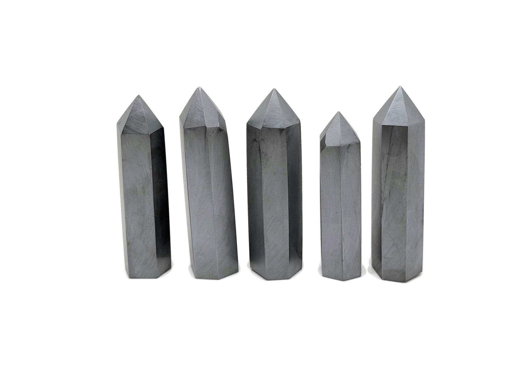GemstoneGO Terahertz Obelisk Tower Crystal with polished black and gold accents, showcasing intricate gemstone details and smooth surface.