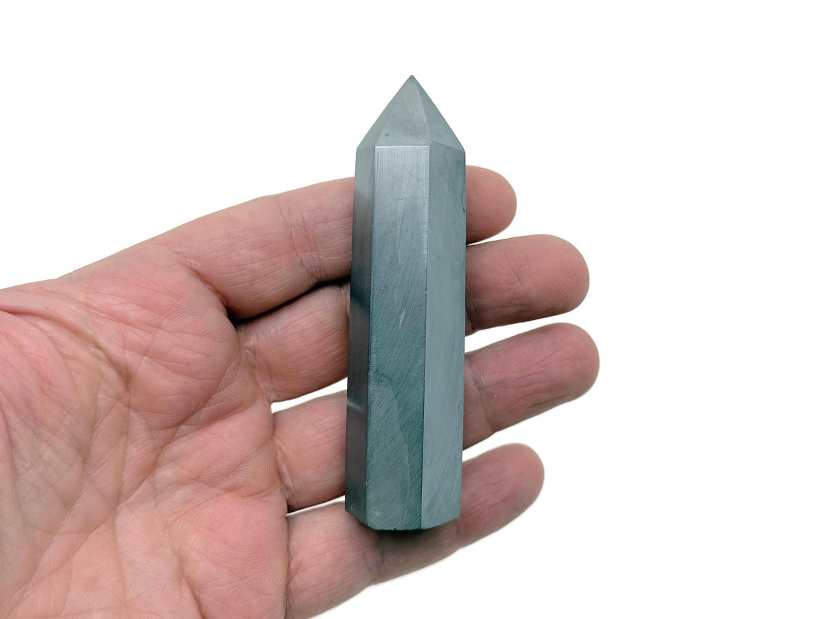 Terahertz Obelisk Tower Crystal by GemstoneGO, showcasing a sleek, polished gemstone obelisk with intricate natural patterns.